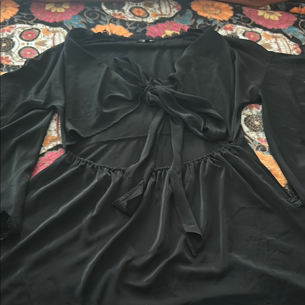 Stylish Black Tie-Front Dress perfect for date night or a fun night out.